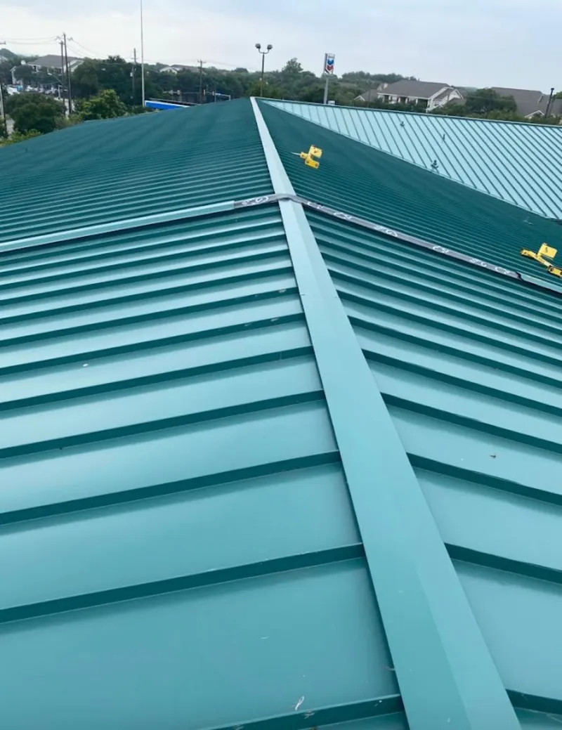 Green commercial metal roof ridge and valley for Metal Roof Repair in Bellwood